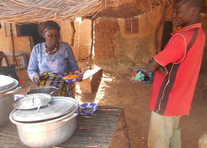 WITH A MICROFINANCE LOAN, GUIRÉ IS ABLE TO GROW HER RESTAURANT